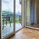 Bild des Zugangs zum Balkon im Zimmer