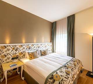 Ansicht des Schlafzimmers der Loft Corner Suite